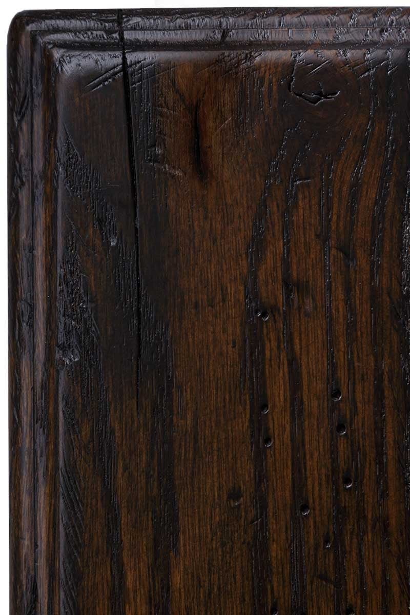 Antiquated Briar on rustic oak, a dark walnut-brown sample panel with heavy grain, worm holes, a check and blackened molded edge