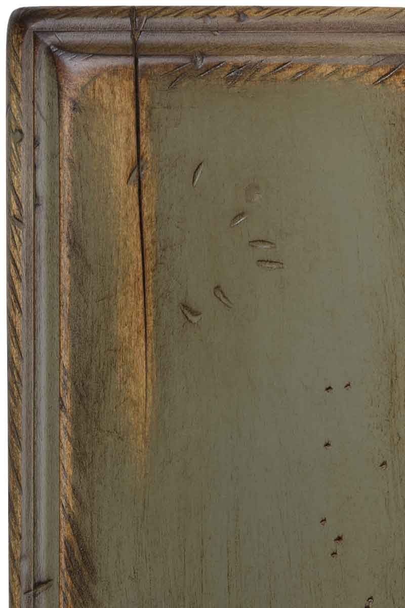 Antiquated Green Frost on brown maple, muted olive-green paint over warm brown wood with worn edges and chiseled distress marks
