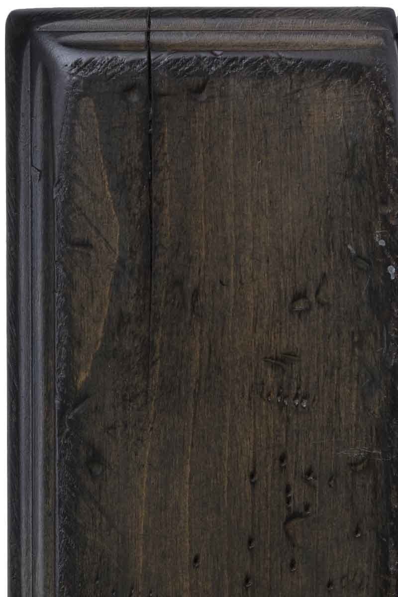 Antique Slate on maple, a near-black charcoal painted sample with worn molded edges, chisel marks and punched worm holes