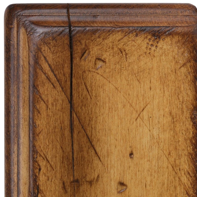 S-2 antiqued maple sample corner, light golden brown finish with dark chisel marks framing the rounded molding
