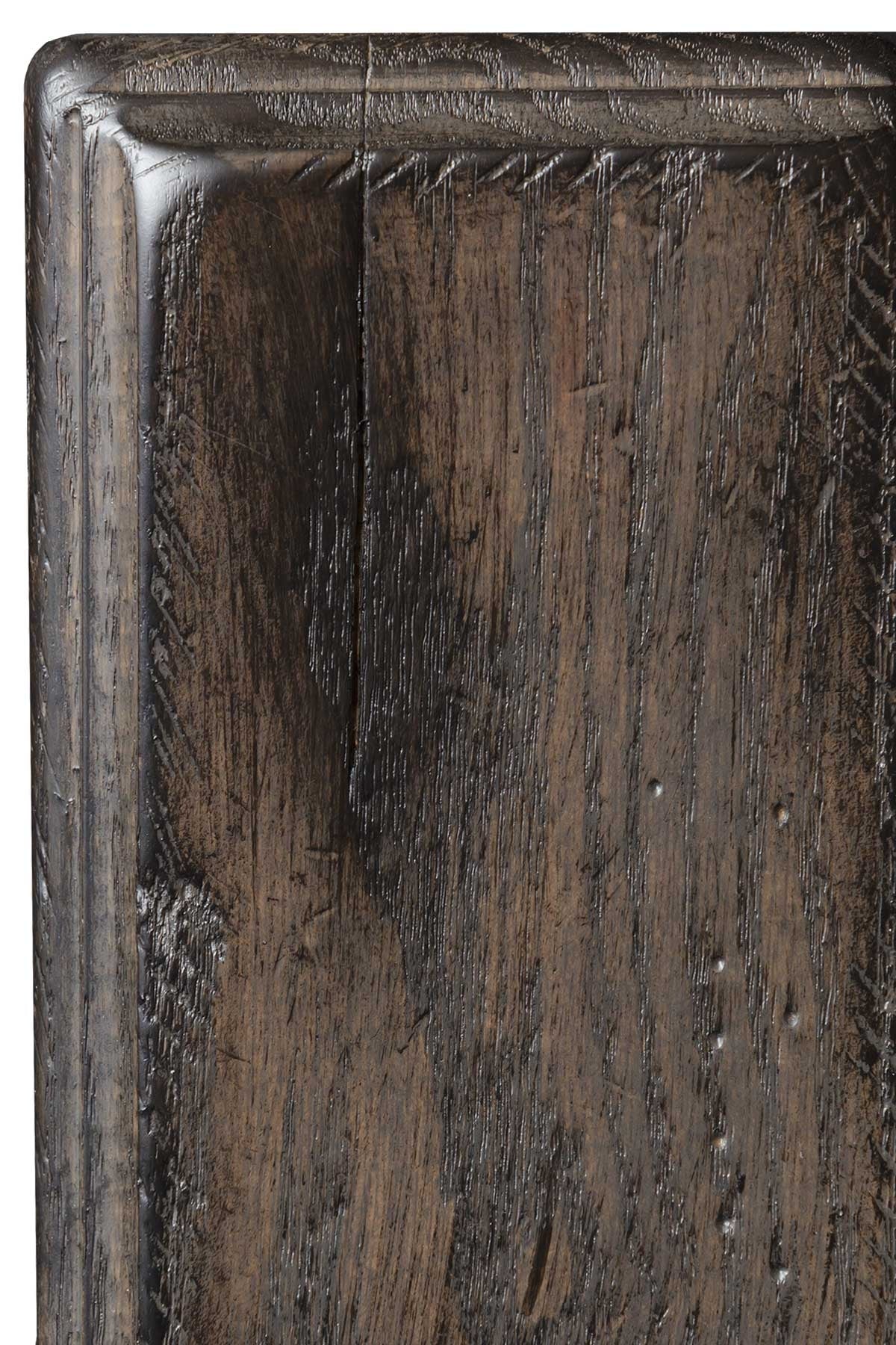 Antiquated Smoke on oak, a near-black brown sample panel with open oak grain, worn edges and scattered worm holes