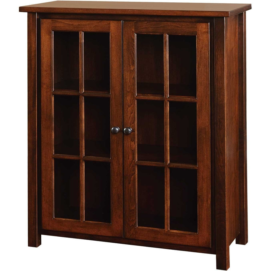 Compact bookcase cabinet with two six-pane glass doors, three shelves inside and small round knobs, angled view