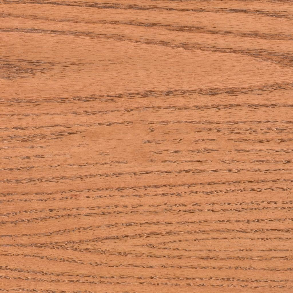 Fruitwood stain on oak showing a light golden tan tone with clear cathedral oak grain arching across