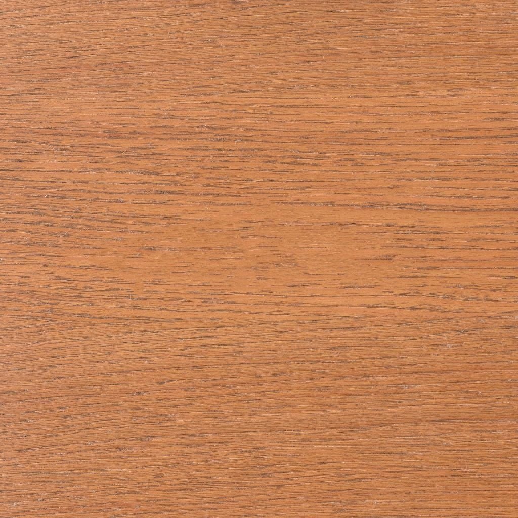 Fruitwood on quartersawn white oak, a soft light caramel swatch with straight tight grain and faint ray flecks