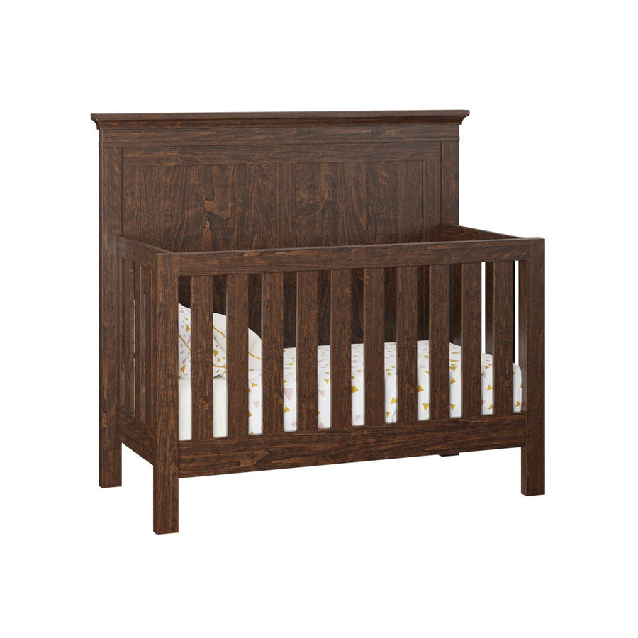 Dark walnut stained convertible crib with a raised two panel headboard, crown molding top and slatted sides