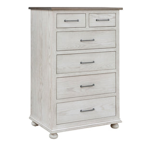 Six drawer chest in an antique white finish with a weathered gray top, pewter pulls and turned bun feet