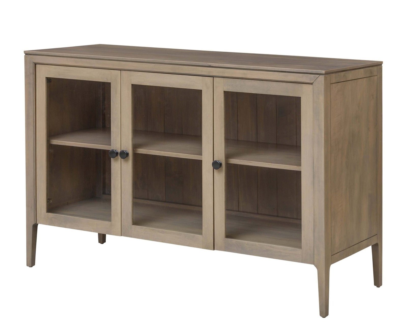 Three door glass front TV cabinet in a light driftwood finish, styled with pottery and fruit on its interior shelves