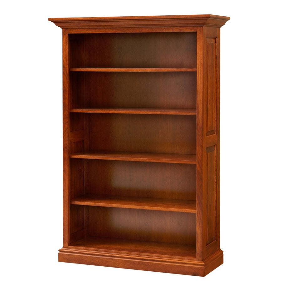 Five foot cherry bookcase with crown molding, four adjustable shelves and paneled sides on a white background