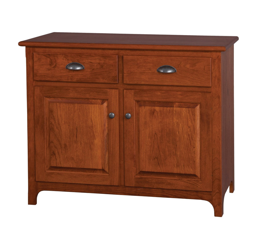 Two-door cherry buffet with two drawers, dark cup pulls, raised panel doors and shaped flared feet