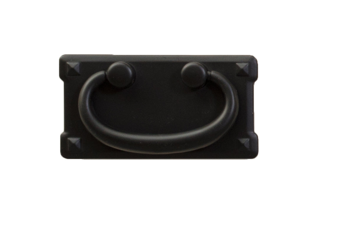 Rectangular black bail pull with pyramid corners, the standard drawer hardware for the wardrobe