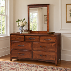 Amish Concord 7-Drawer Triple Dresser shown in the bedroom of a traditional colonial home