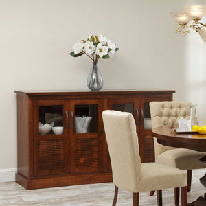 Cherry finish 72 inch four-door sideboard with two glass doors and two louvered doors, styled with flowers in a dining room