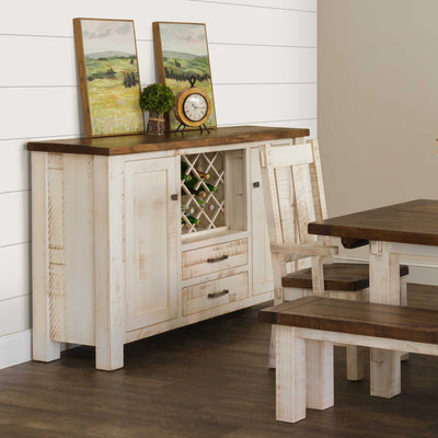Distressed white sideboard buffet with a rustic brown top, lattice wine rack and two drawers below framed art