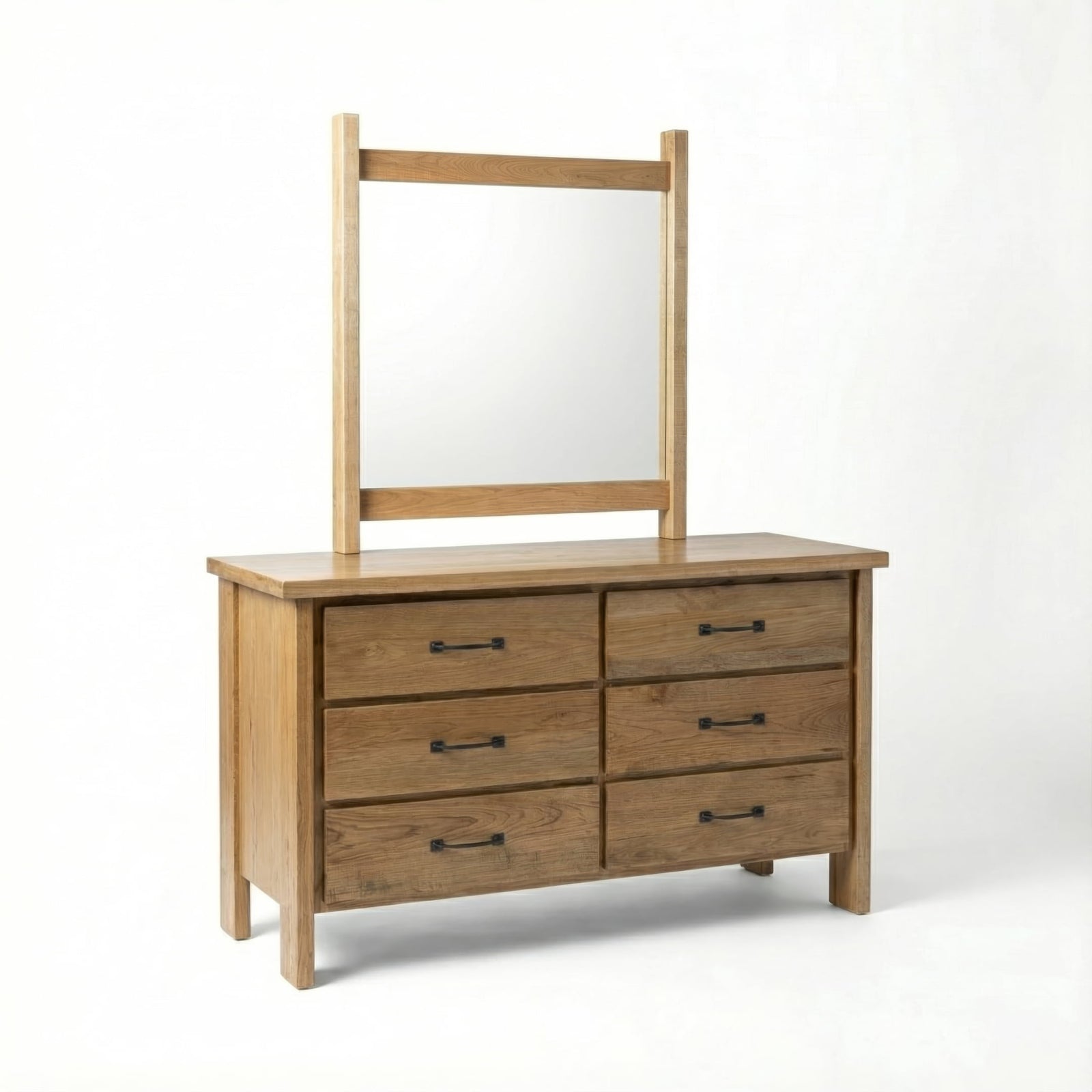Wooden dresser with mirror on a white background
