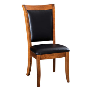 Dining chair in a medium brown finish with a black upholstered back panel and matching padded seat