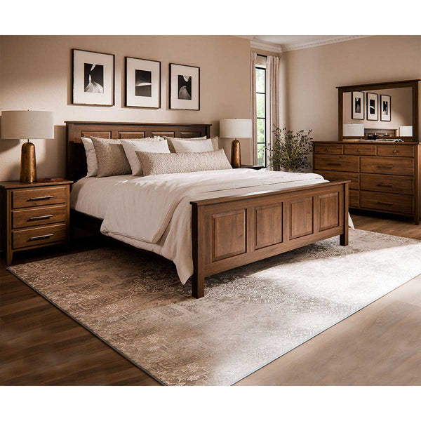 Bedroom set with a high panel bed, brass-lamped nightstands and a mirrored dresser on a soft patterned rug
