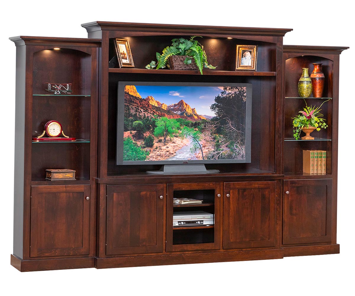 Wooden entertainment center with TV and decorative items on a white background