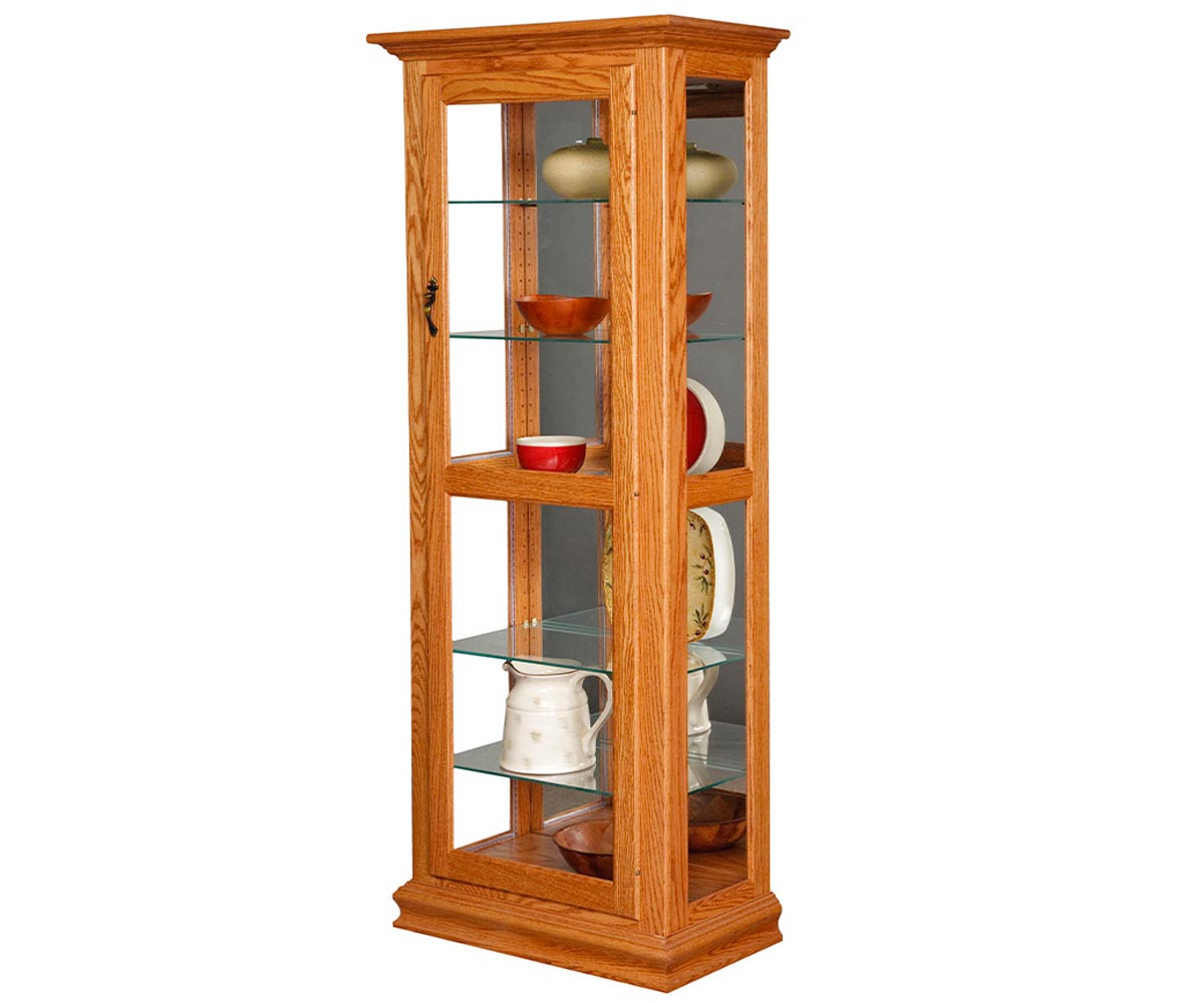 Wooden display cabinet with glass doors containing ceramic items on a white background