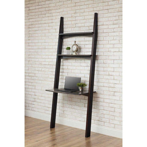 Leaning wall desk with two upper display shelves and a laptop work surface, black frame on white brick