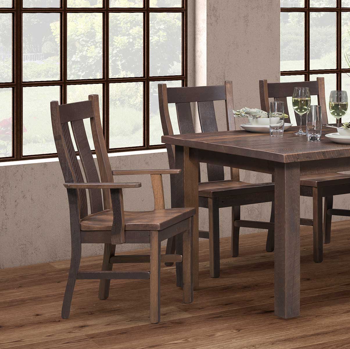 A dark brown wooden dining chair with a slatted backrest and a slightly curved seat, shown against a plain white background.