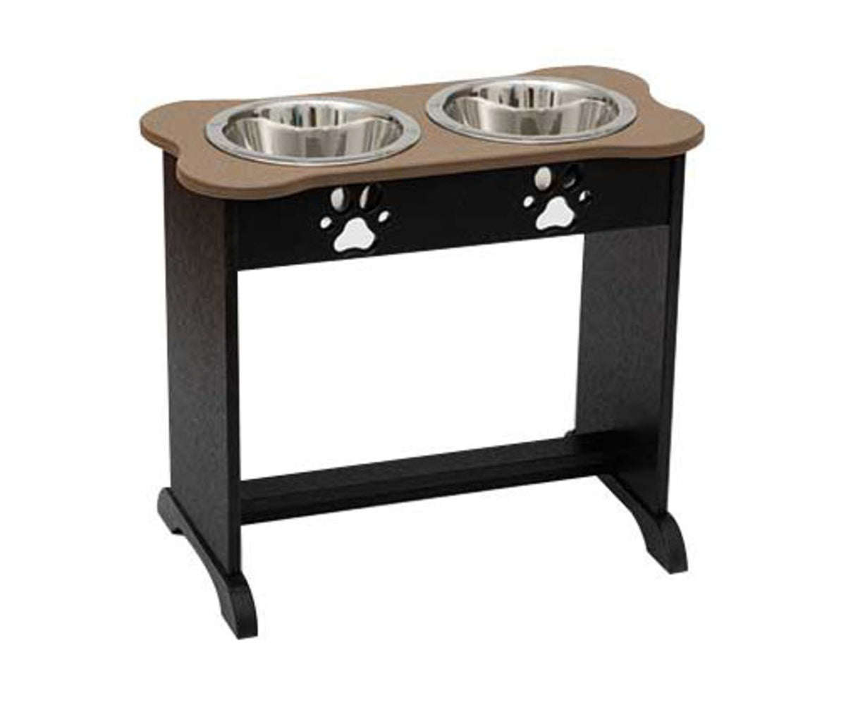 Dog drinking from a raised pet water bowl in a home setting