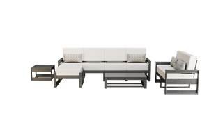 Gray poly patio group with white cushions: five-seat sofa, loveseat, ottoman and two low tables