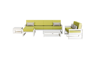 White frame poly patio group with green cushions, long sofa, loveseat, ottoman and two poly tables
