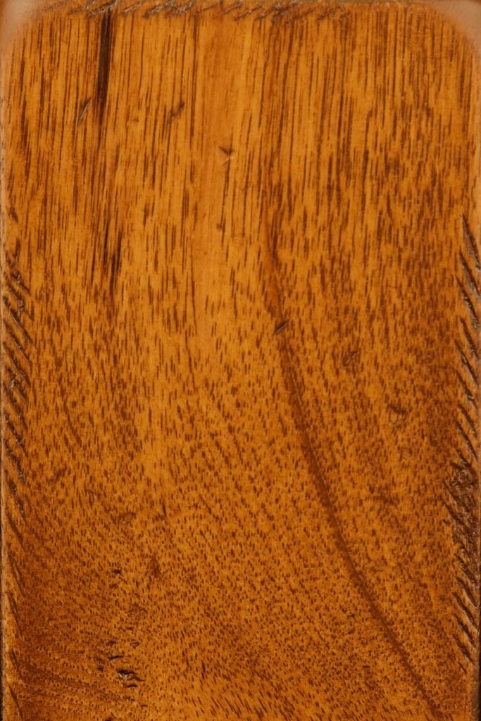 Aged Harvest on rustic hickory sample, a golden amber board with tight speckled grain, small knots and distressed filed edges