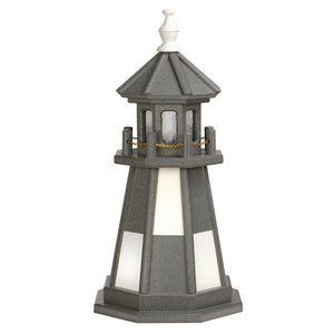 Dark gray poly garden lighthouse with white window panels, gray lantern room, white finial and gold chain railing