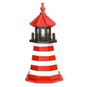 Red and white banded wooden lighthouse with red roof over a black lantern room and a red octagonal base