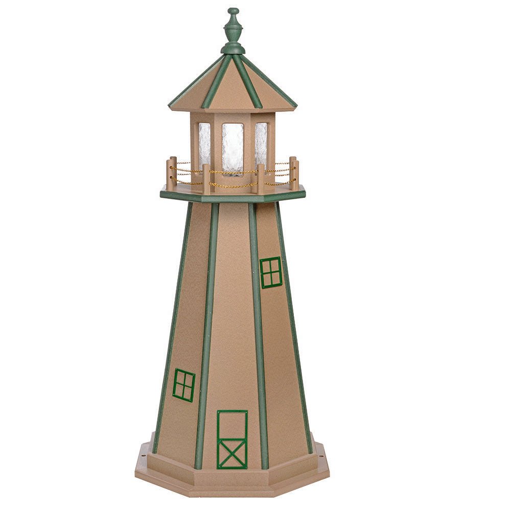Weathered wood toned lighthouse with green corner stripes, green window and door outlines and a green lantern roof