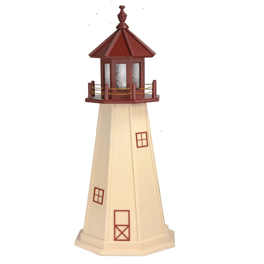Ivory wooden lighthouse with cherry red lantern room, red window frames and door outline and a wide ivory base