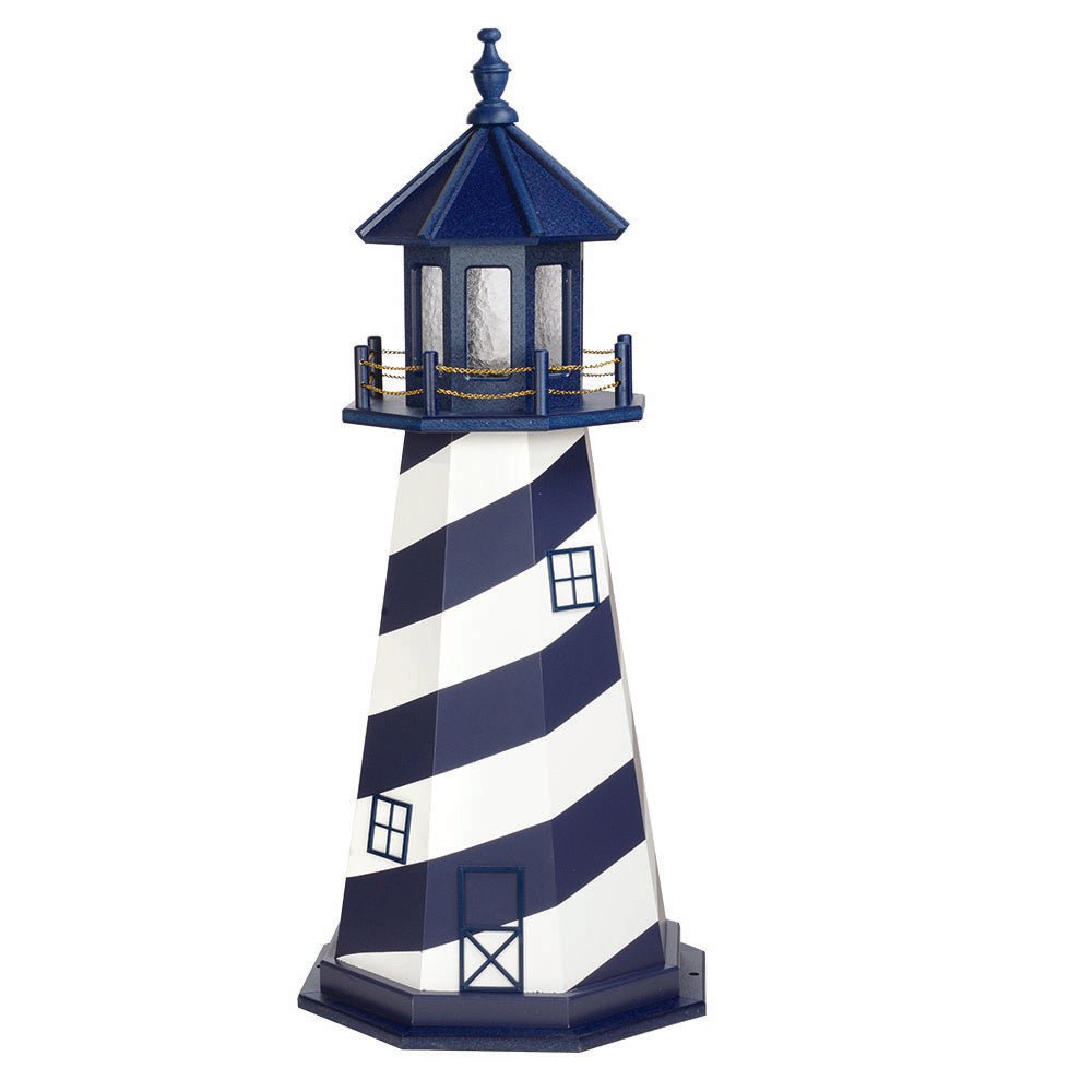 Navy and white spiral striped lighthouse with blue lantern room, blue window outlines and gold chain railing