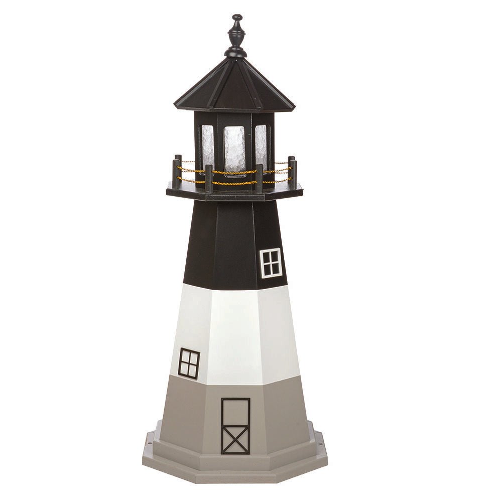 Three tone lighthouse with gray base, white middle band and black upper tower, topped by a black lantern room