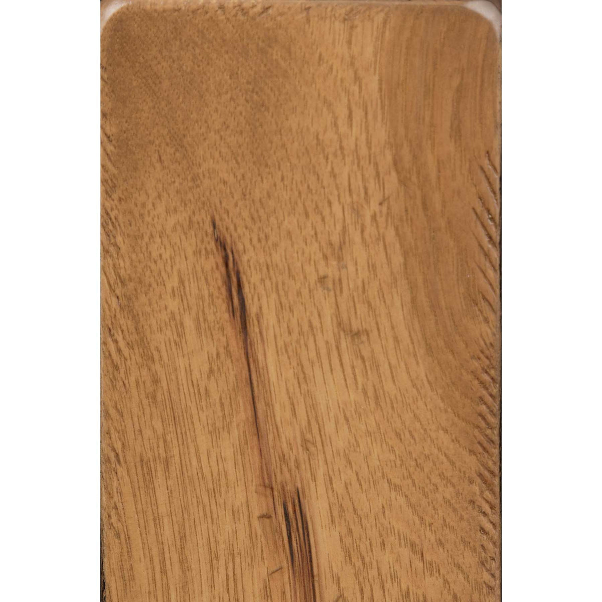 Close-up of a natural oak leg showing straight grain, a small check and satin finish