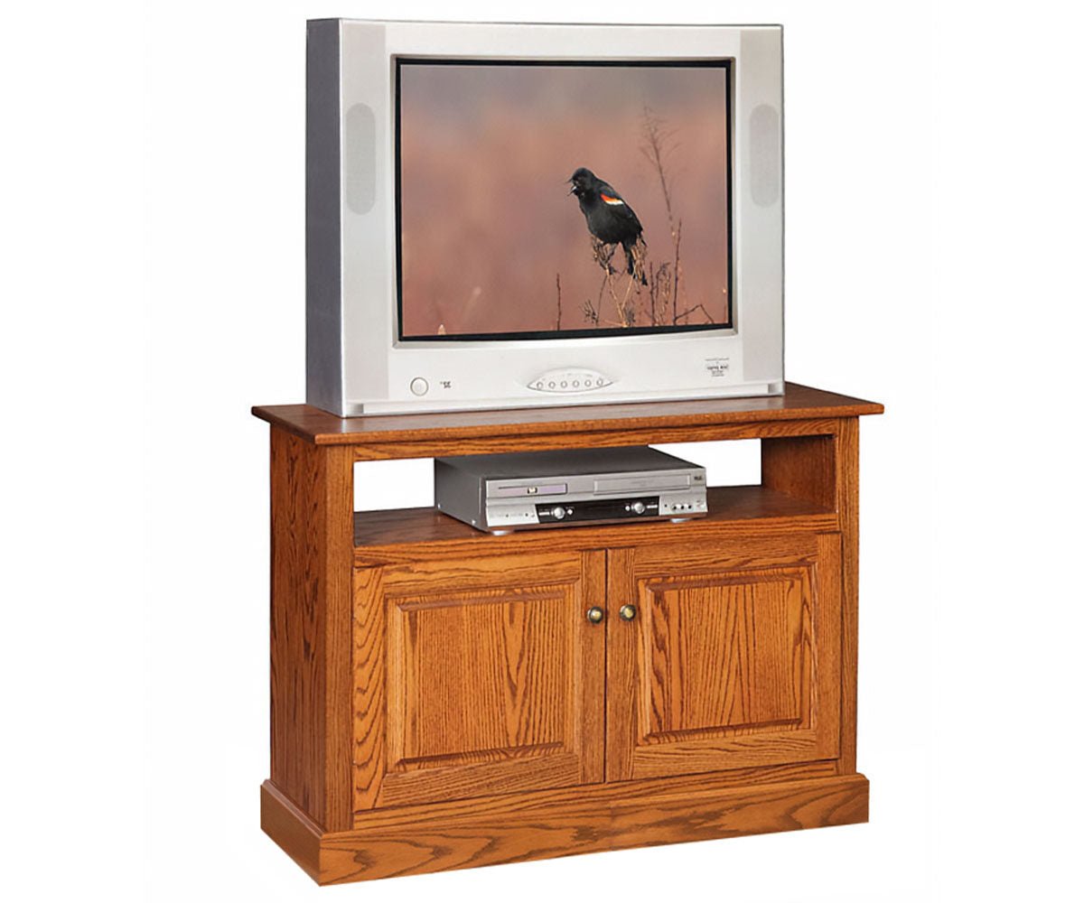 Wooden TV stand with a television displaying a bird on a white background