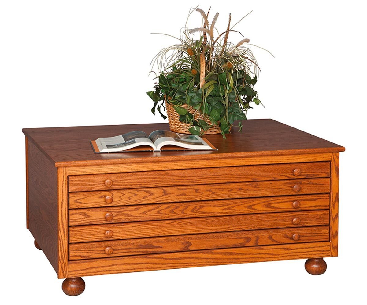 Oak five drawer flat file cabinet with round wood knobs, bun feet and a plant basket on the top, on a white background