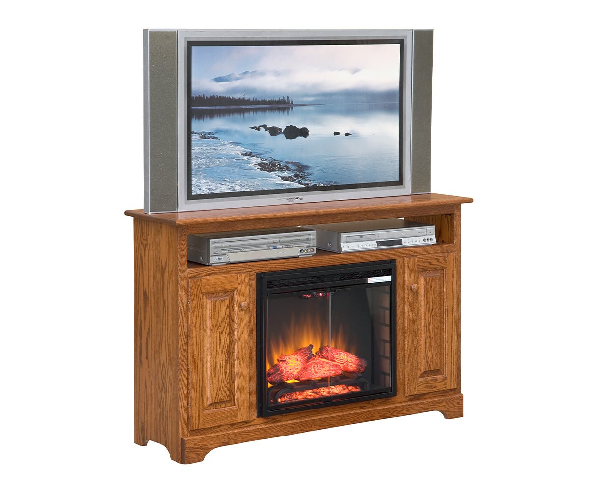 Oak TV stand with a 23 inch electric fireplace glowing below the TV, placed on a shiplap wall in a bright farmhouse living room