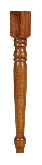 Close view of a turned oak dining table leg with ring detail and a warm medium stain on a white background