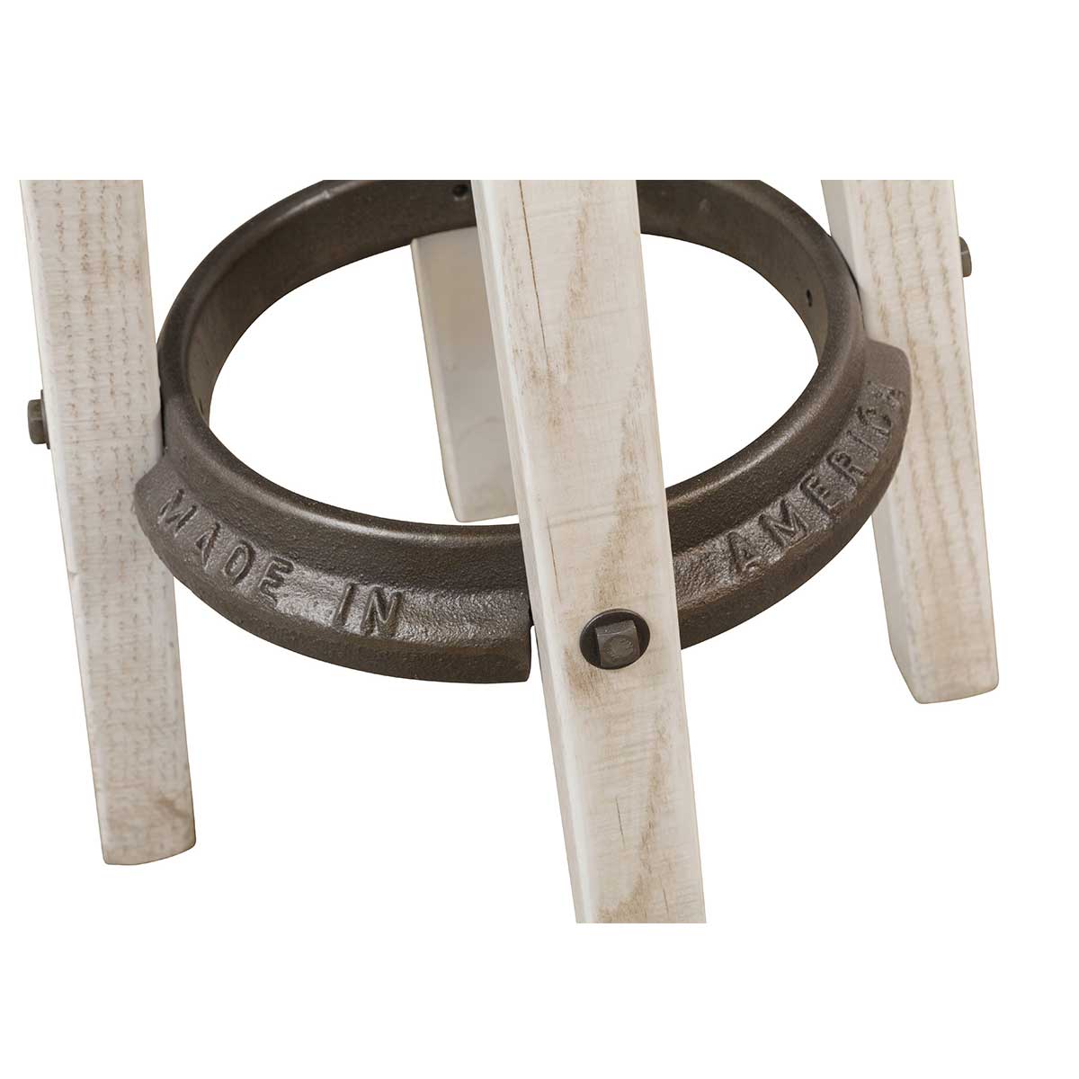 Detail of the swivel stool base showing the Made in America cast iron foot ring bolted to whitewashed legs