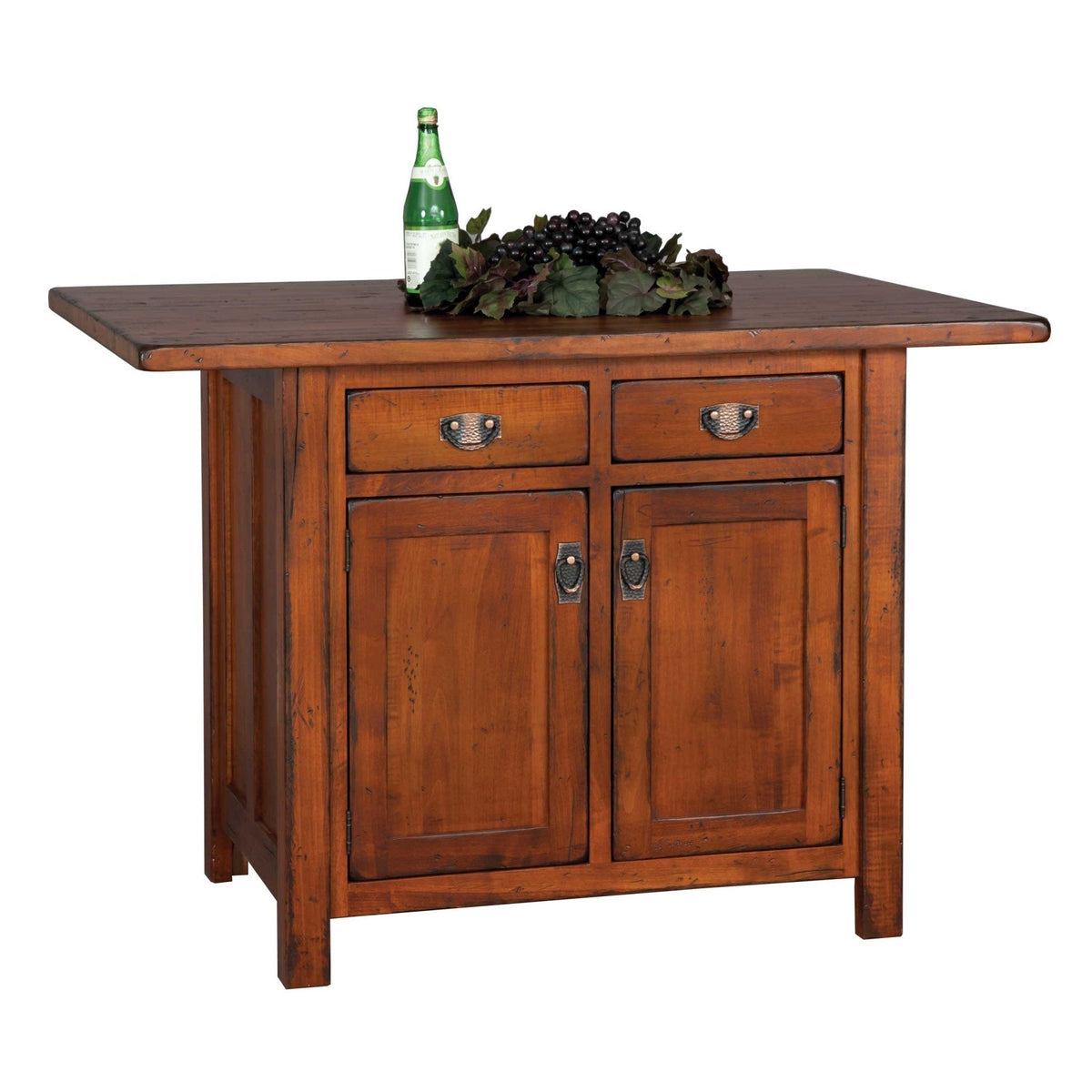 Warm cherry compact kitchen island with drop leaf top, two drawers and two panel doors styled with grapes