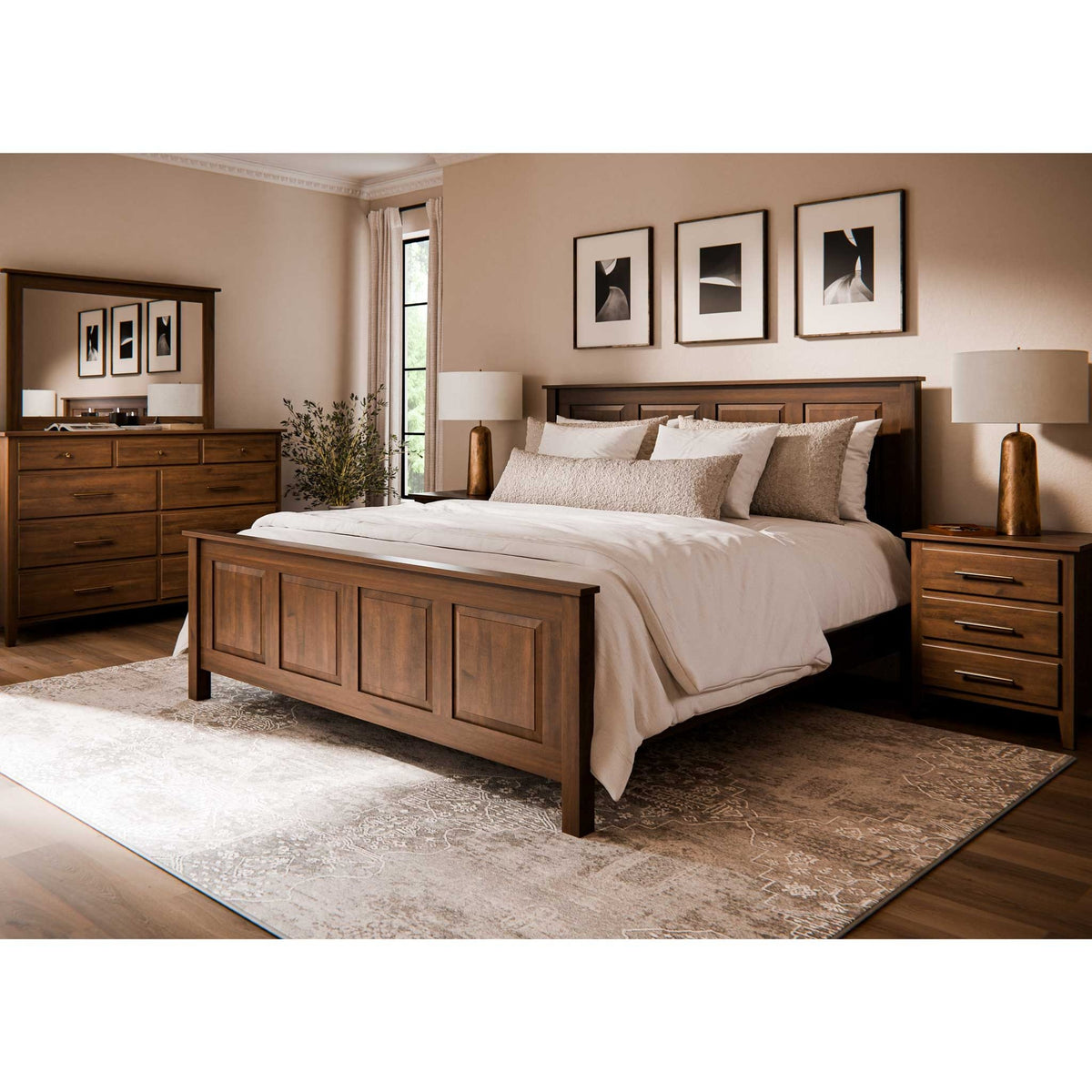 High panel bed with low footboard staged in a bedroom with mirrored dresser, nightstands and brass lamps