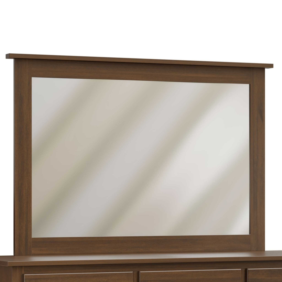 Close-up of a wide rectangular dresser mirror in a simple walnut frame with a flat top cap