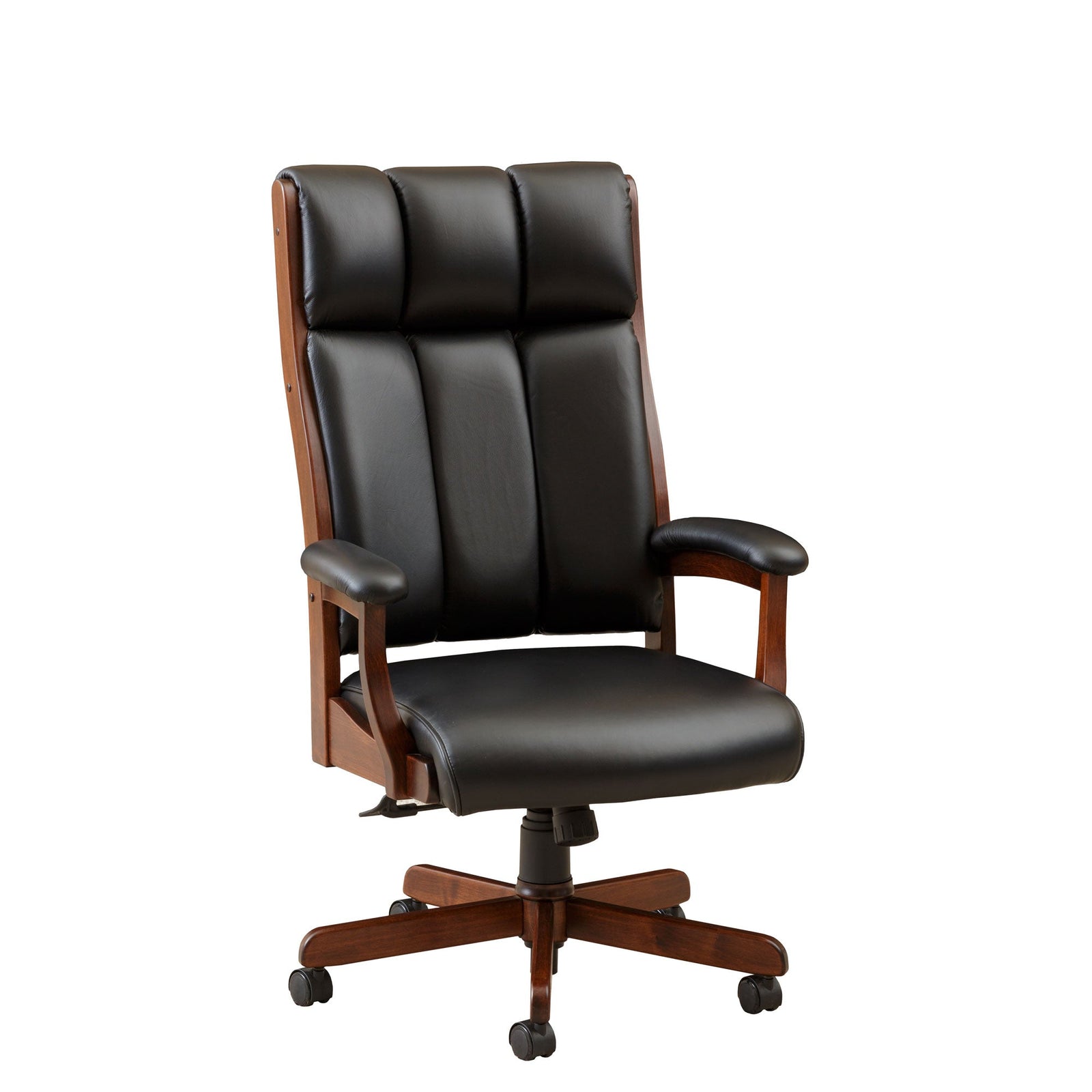 Black leather executive desk chair with channeled back and wood arms beside a cherry desk with hutch