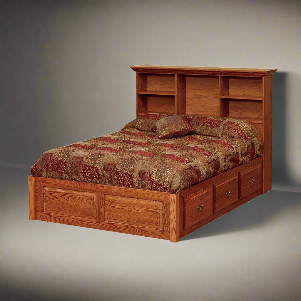 Oak bookcase headboard platform bed with open cubby shelves and three underbed storage drawers, tapestry quilt