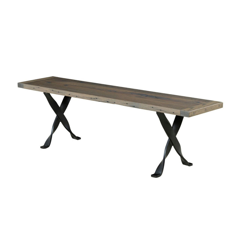 Long gray plank bench on black twisted iron X legs shown from the side on a white background