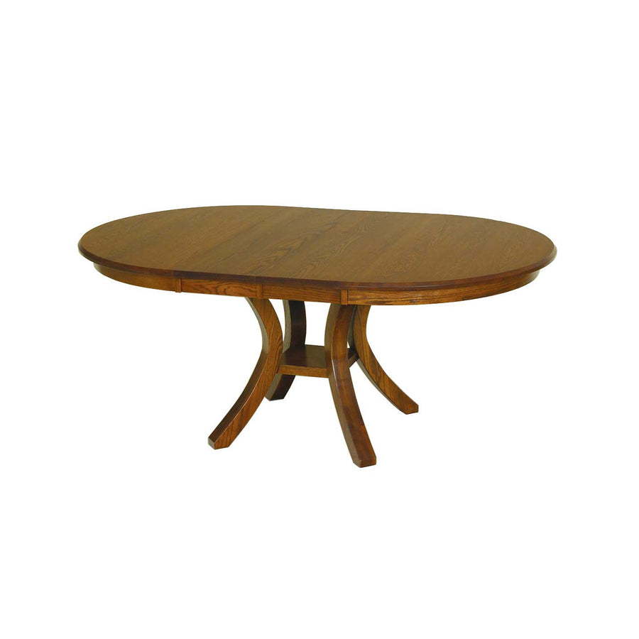 Oak round expandable dining table extended with a leaf, showing curved four-post pedestal base on a white background