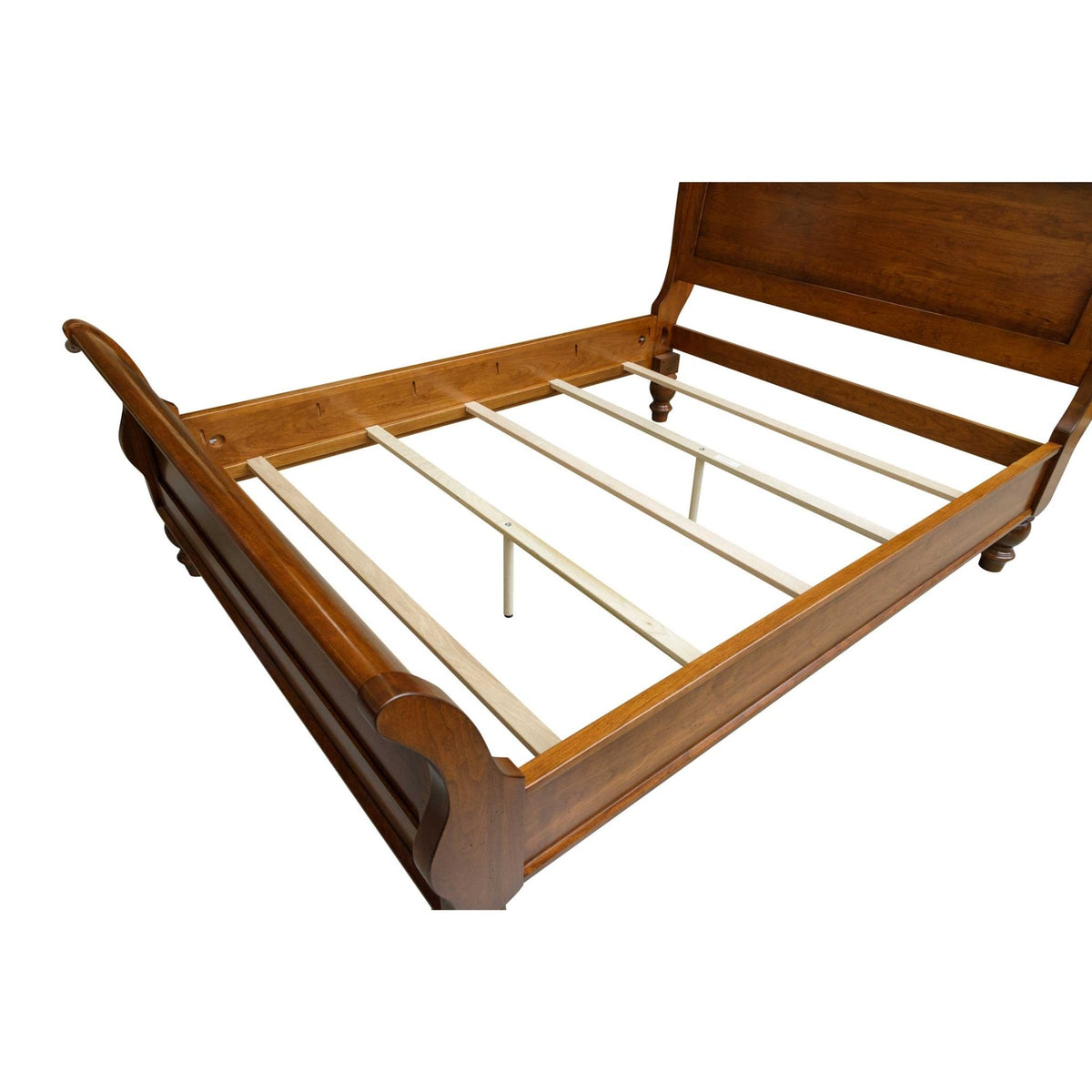 Cherry sleigh bed frame with curved footboard shown without a mattress, revealing maple slats and center supports