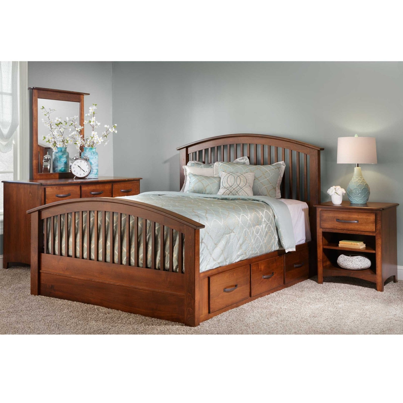 Cherry bedroom set with an arched slat storage bed, three under-bed drawers, dresser mirror and open nightstand