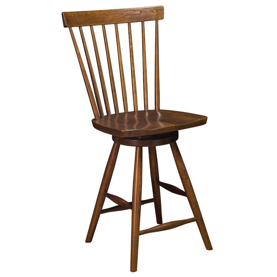 Swivel Windsor bar stool in a warm walnut finish with a saddle seat, swivel ring and splayed legs on white